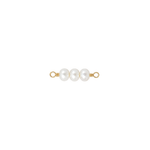 Gold and pearl jewelry piece on a white background