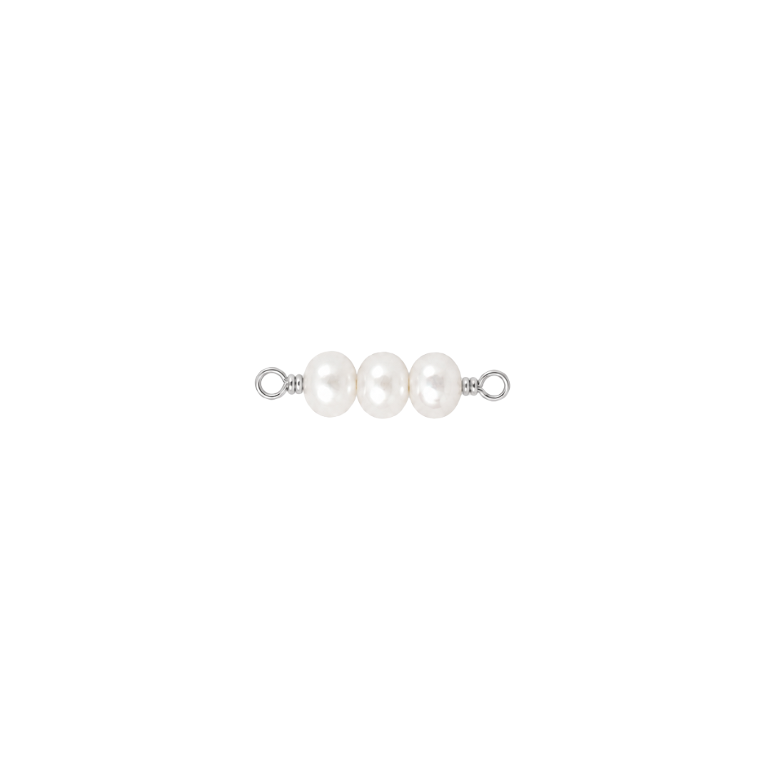 Pearl barrette with three pearls on a white background