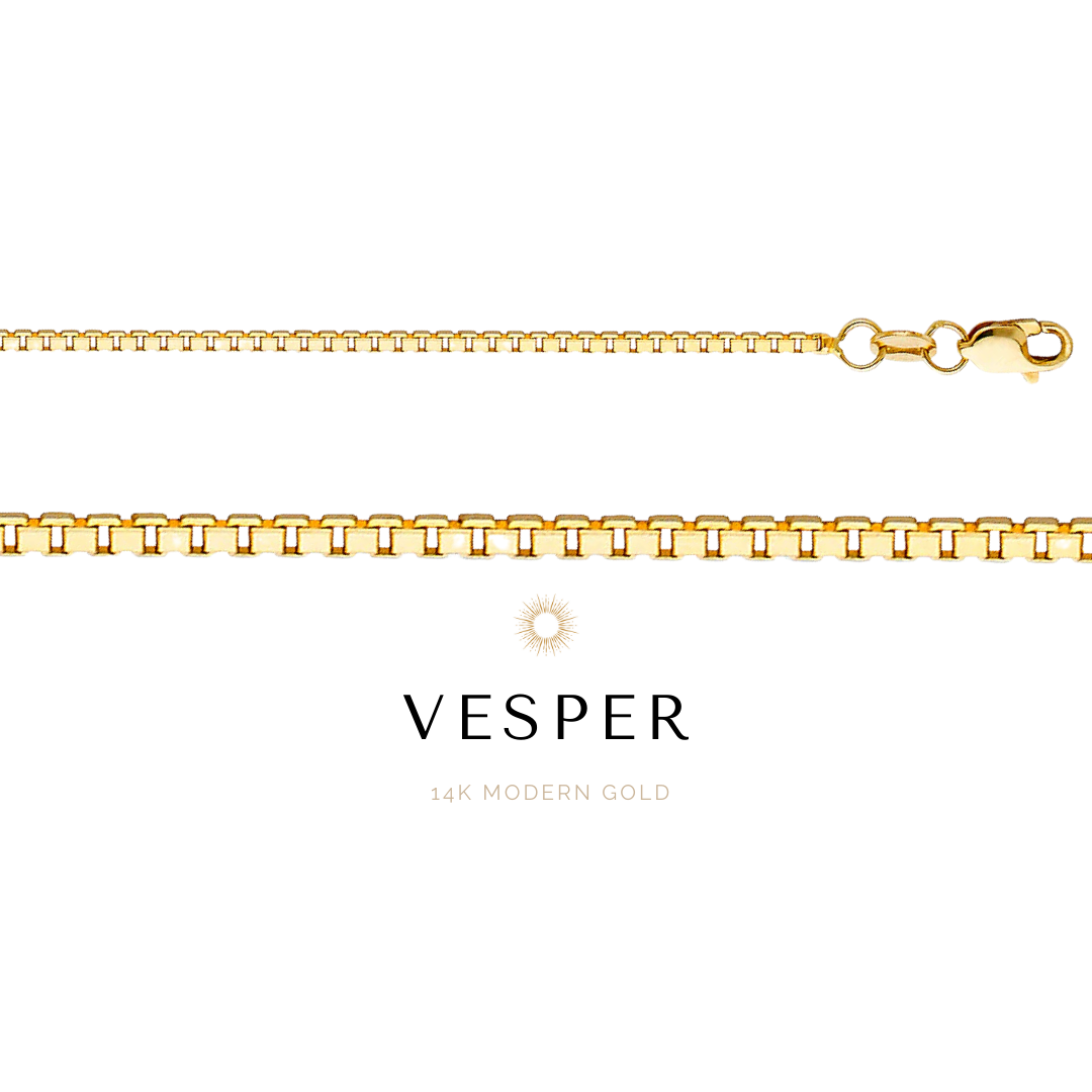 Gold chain bracelet with clasp on a white background, featuring the brand 'Vesper'.