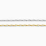 Two gold chains on a white background