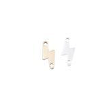 Two gold and silver metal tags on a white background