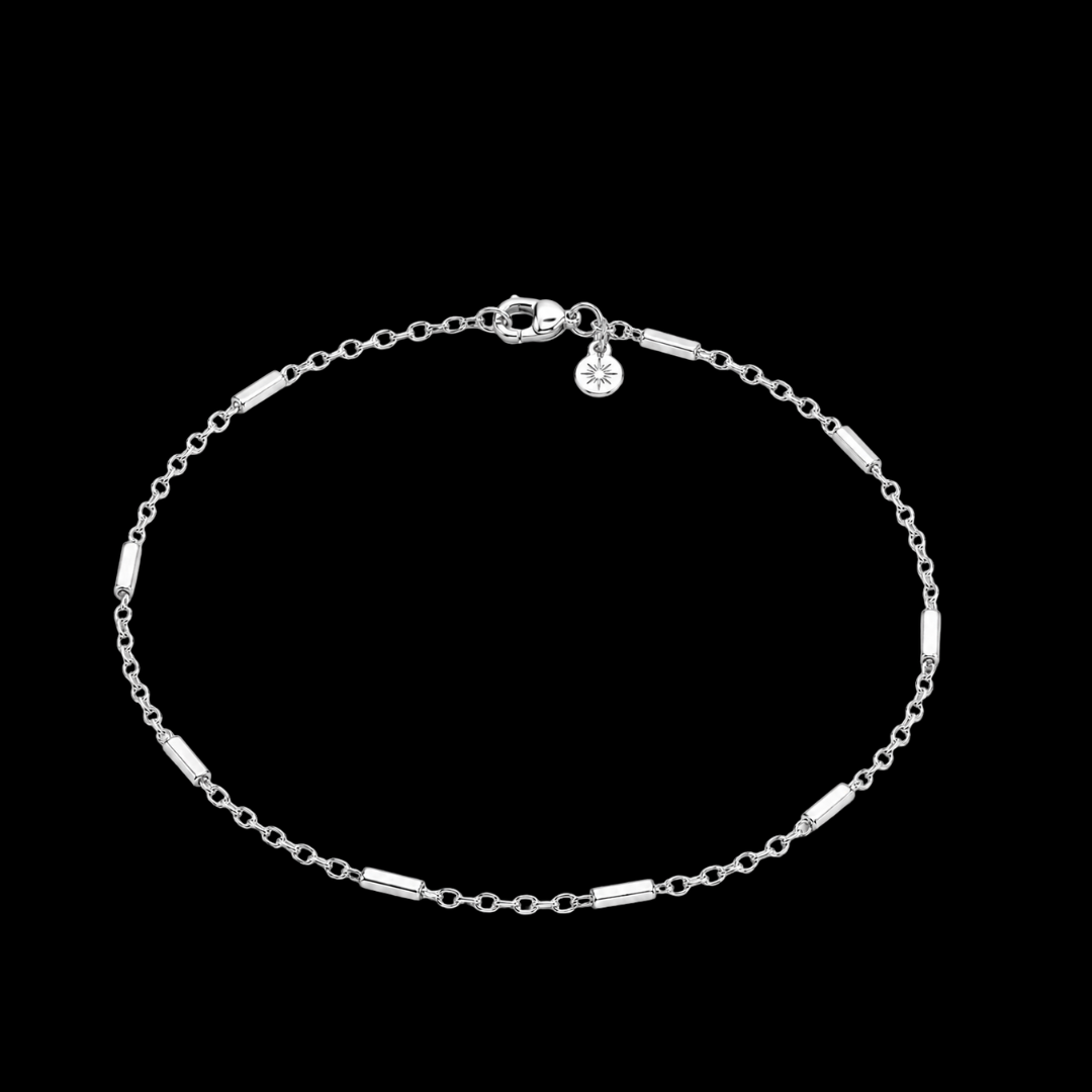 Golden Bond Silver infinity chain bracelet on a black background