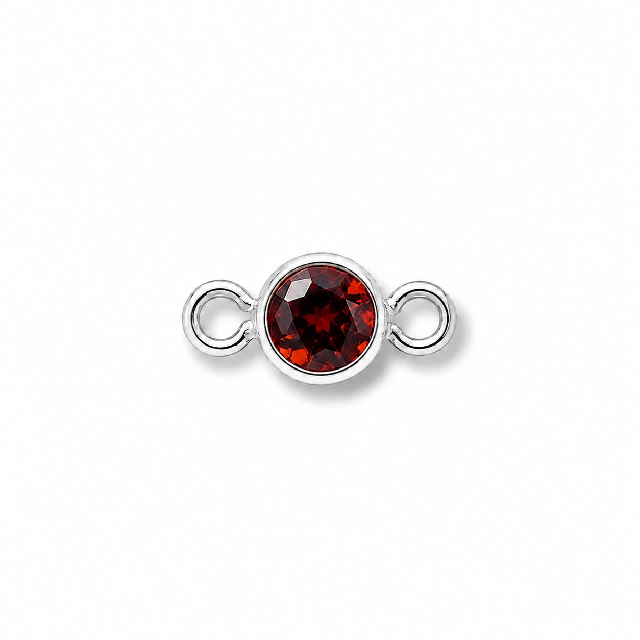 Silver jewelry connector with a January red garnet gemstone on a white background