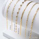 Permanent jewelry chains on a white leather bracelet ramp in Great Falls, Virginia