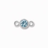 Silver jewelry connector with a light blue gemstone on a white background