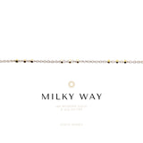 Necklace with gold and silver beads on a white background, featuring the brand 'Milky Way'.