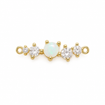 A gold-plated jewelry chain extender featuring a central round white opal surrounded by clear cubic zirconia stones on each side, set against a plain white background.