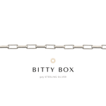A rectangular link chain bracelet in 14K modern gold fill, with the brand name 'BITTY' mentioned above.